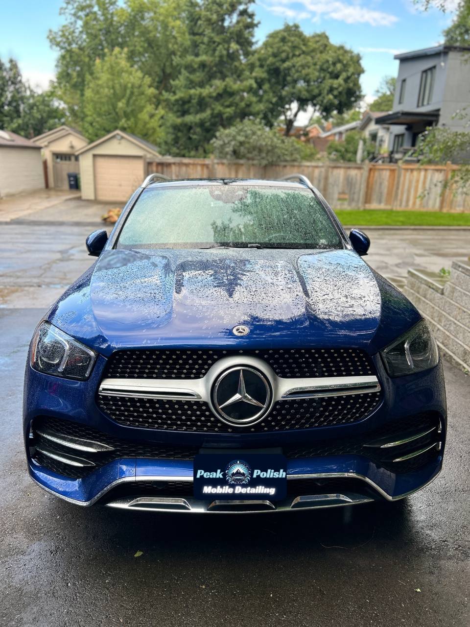 Peak Polish Mobile Detailing 2-in-1 package, showcasing a clean Mercedes SUV with a spotless exterior and well-maintained interior